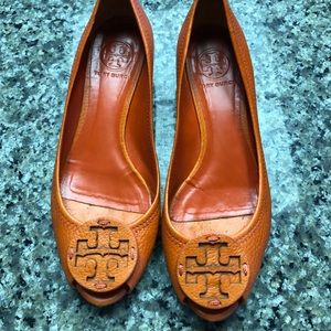 Tory Burch one inch (small wedge) open toed shoes.